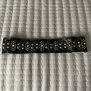 Black headband with studs.